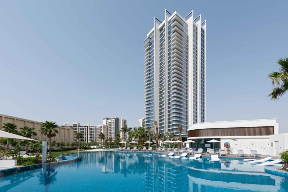 Urban Resort w Golf Course Views Close to Beach