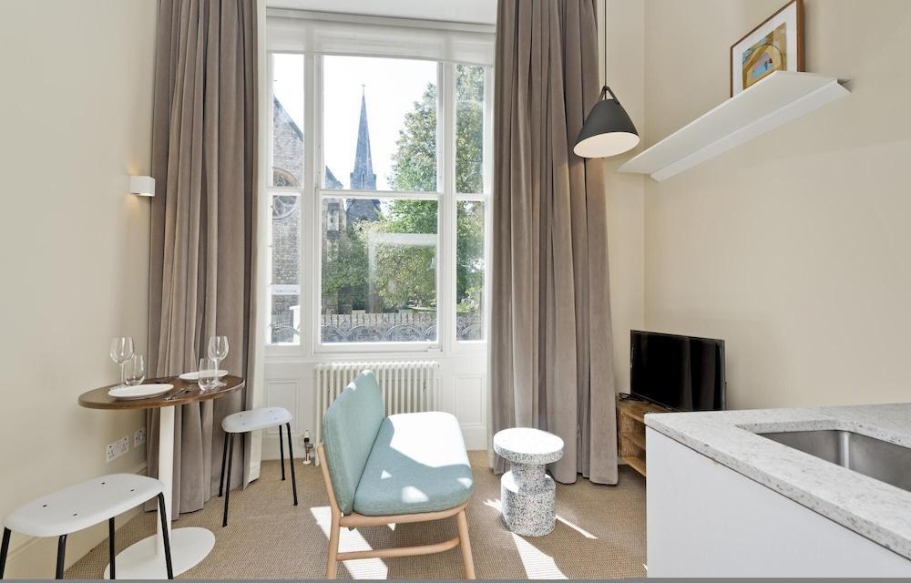 Stylish Mezzanine Studio in Leafy Primrose Hill - Tap to explore photos