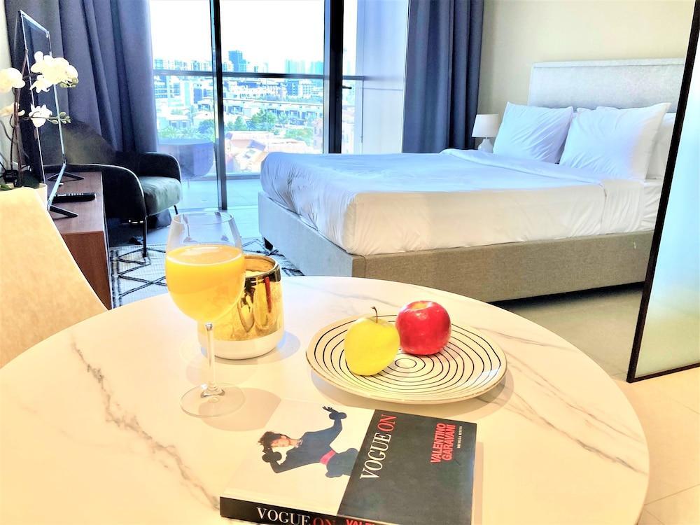 Amazing Living With Balcony - Park View JVC - Tap to explore photos