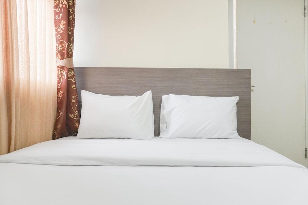 Good Deal And Relaxing 2Br Green Pramuka City Apartment - Tap to explore photos