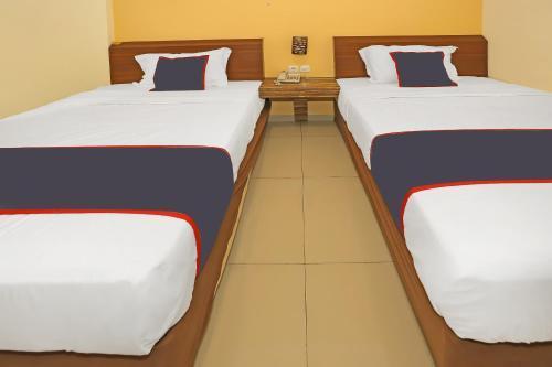 Collection O 92130 Hotel Fiducia Kaji - Tap to explore photos