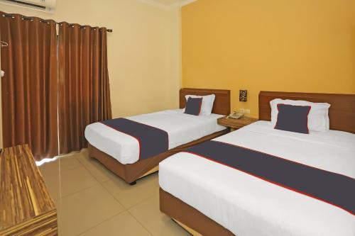 Collection O 92130 Hotel Fiducia Kaji Room Type - Delxue Twin Room