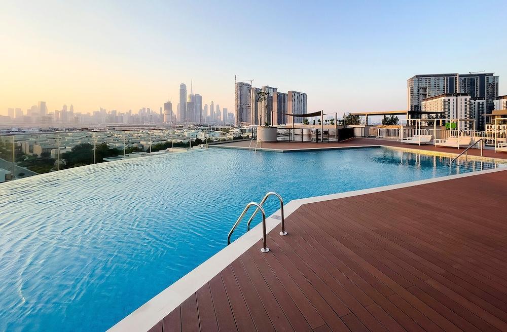 Stylish 1BR in Sobha Grande - Tap to explore photos