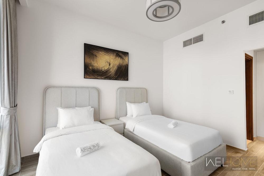 WelHome - 3BR Apt Located Directly on the Dubai Water Canal - Tap to explore photos