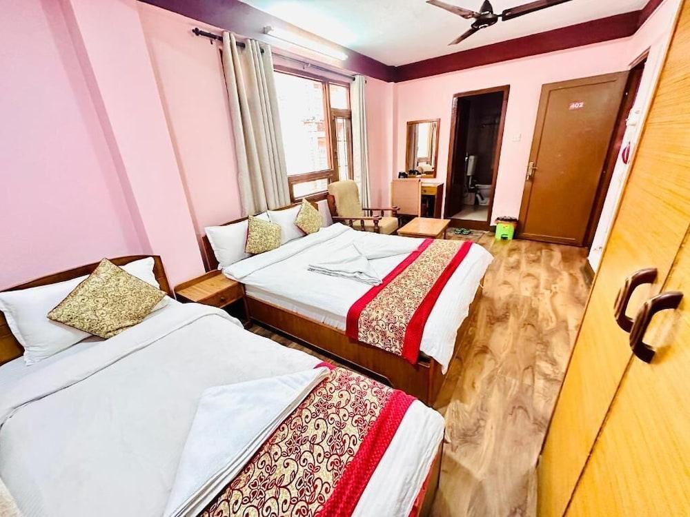Hotel Green Orchid pvt ltd Room Type - Family Triple Room