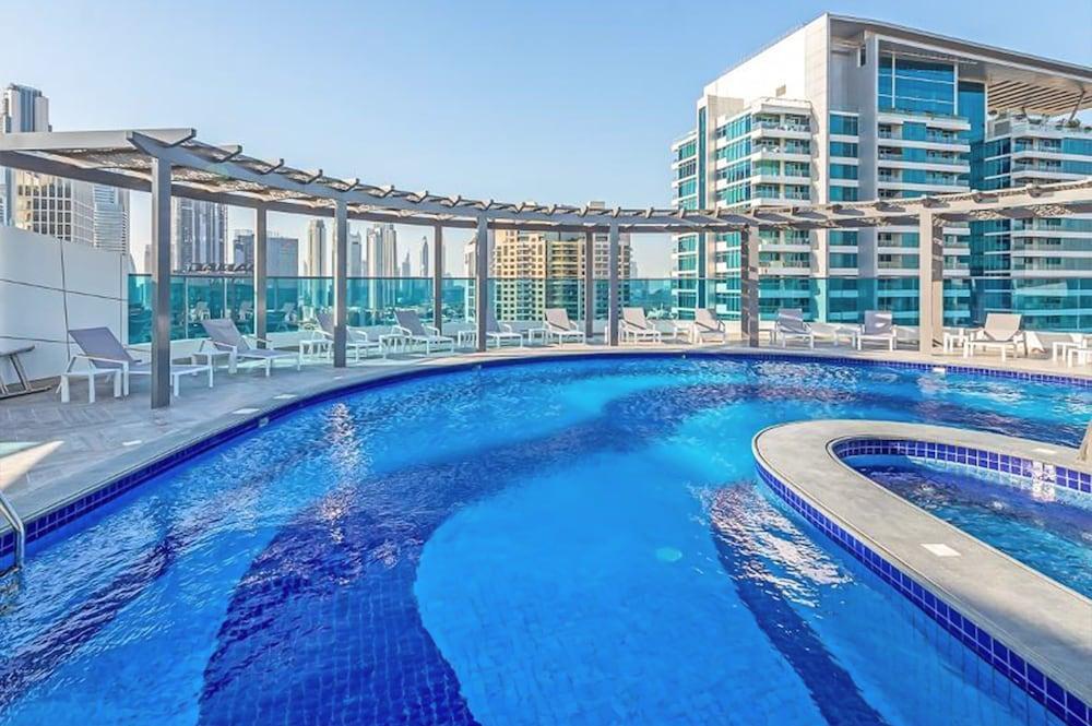 Stylish 1BR with Skyline View - THE BAY - Tap to explore photos
