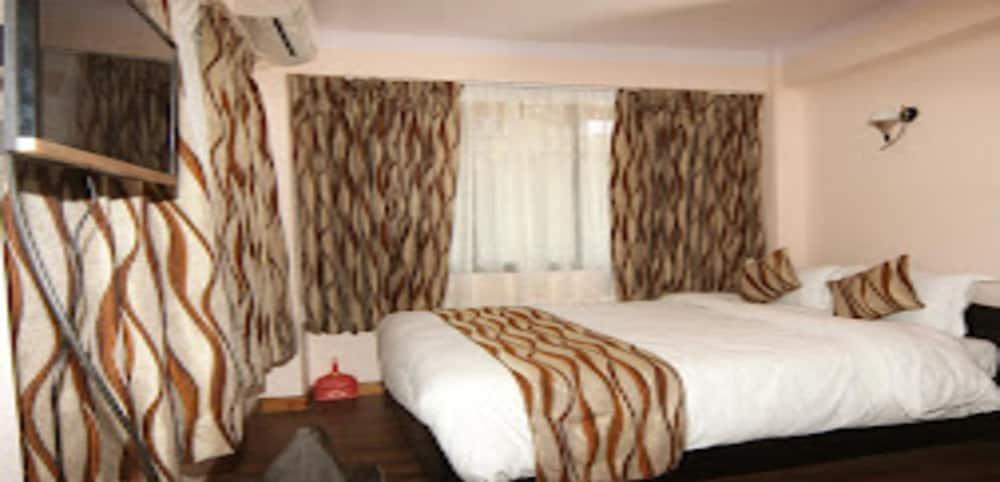MeroStay 206 Hotel KU - Tap to explore photos