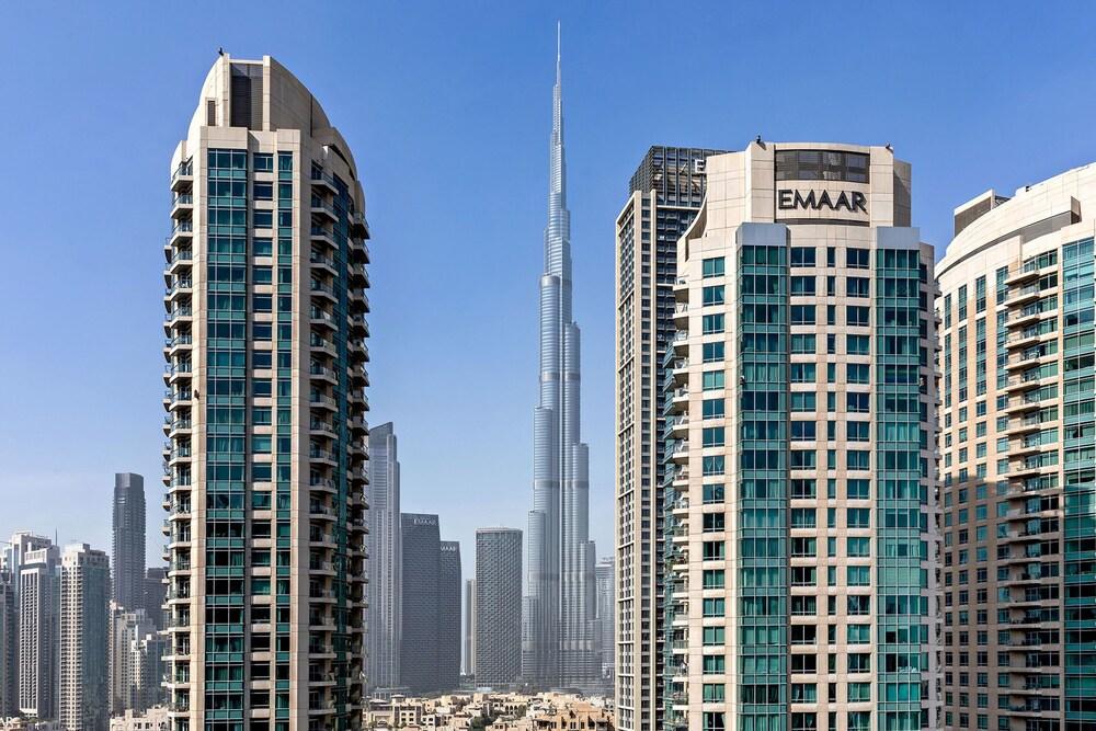 Luxury 1BR Apartment with Burj Khalifa View at Sterling - Tap to explore photos