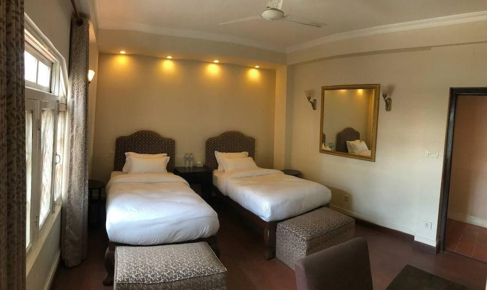 Courtyard Pujan Hotel Room Type - Heritage Deluxe Twin