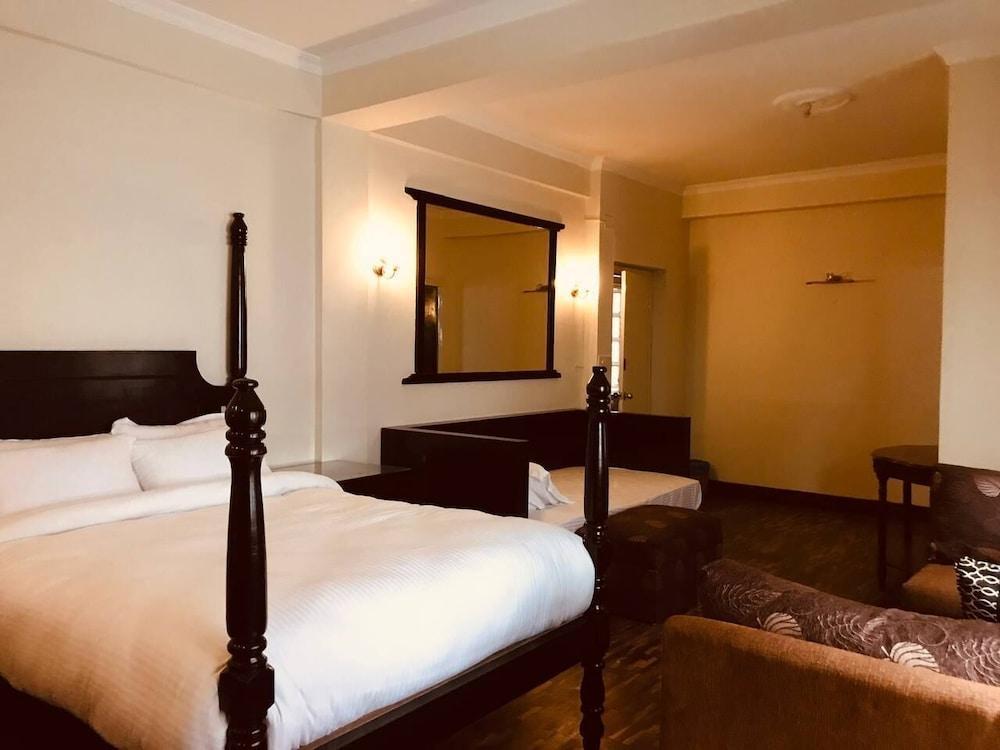 Courtyard Pujan Hotel Room Type - Suit