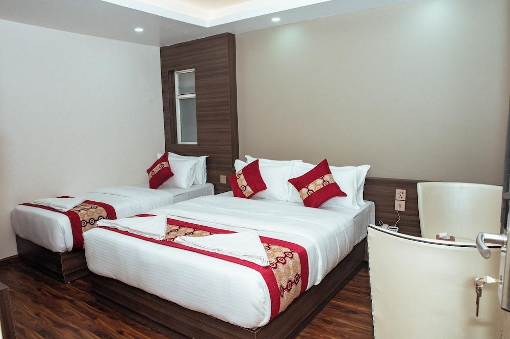 Kusum Airport Hotel Room Type - Family Triple Room