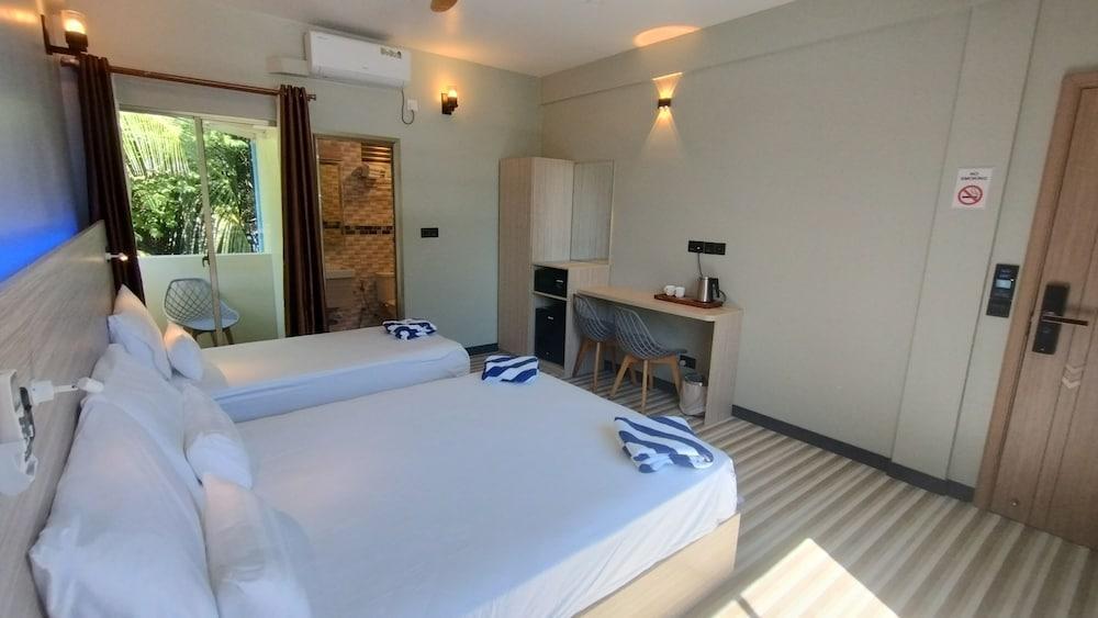 Madi Grand Maldives Room Type - Deluxe Triple Room
