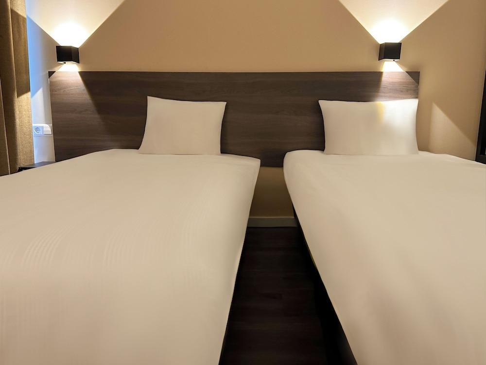 HOTELUX Amsterdam Airport Hotel - Tap to explore photos