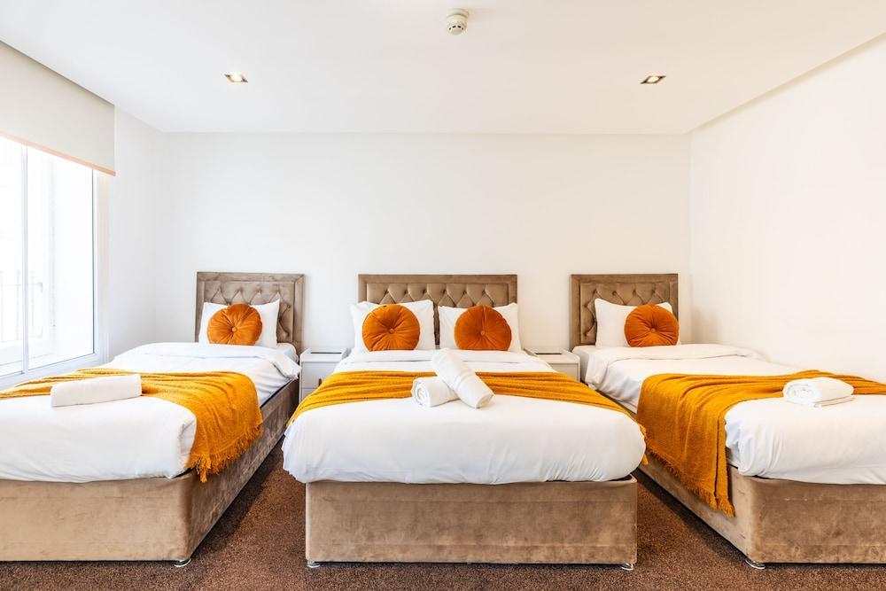 Mayfair Residences Room Type - Premium Quadruple Room, Private Bathroom (External) Mayfair Residences Room Type - Premium Quadruple Room, Private Bathroom (External)