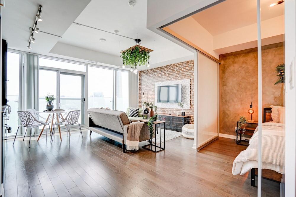 SkyTree Modern Suites - Tap to explore photos