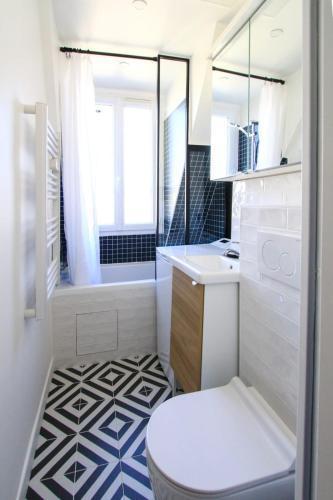 Charming 2-Room 21m Comfort Sacré-Cœur View - Tap to explore photos