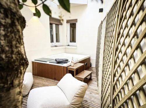 Suite luxueuse avec jardin privatif et jacuzzi Room Type - One-Bedroom Apartment