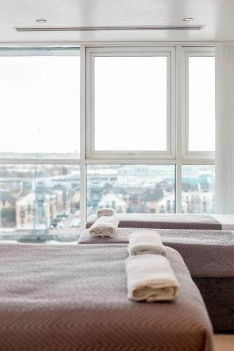 Excel Dock Apartments - Tap to explore photos