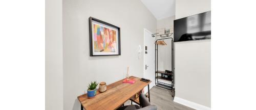 Sunny Serenity: Studio Living with a Breeze - Tap to explore photos