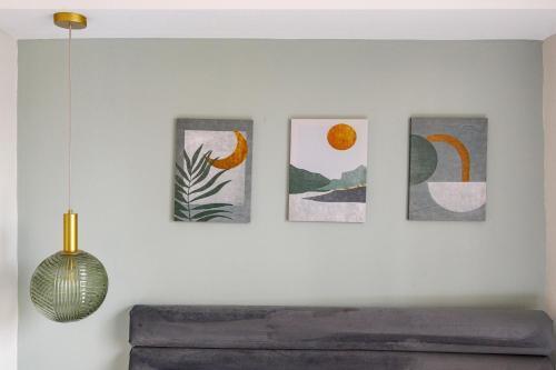 Urban Green Oasis Modern Minimalist Studio - Tap to explore photos