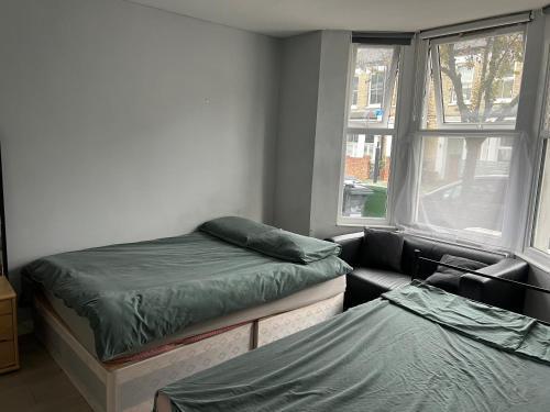 Sterne Street 4 Person Room - Tap to explore photos