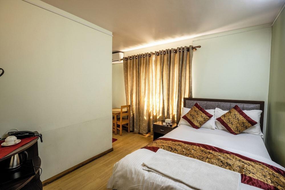 Hotel Harmony & Little Bites Bistro Room Type - A/C Deluxe Room with 1 Single Bed and 1 Double Master Bed