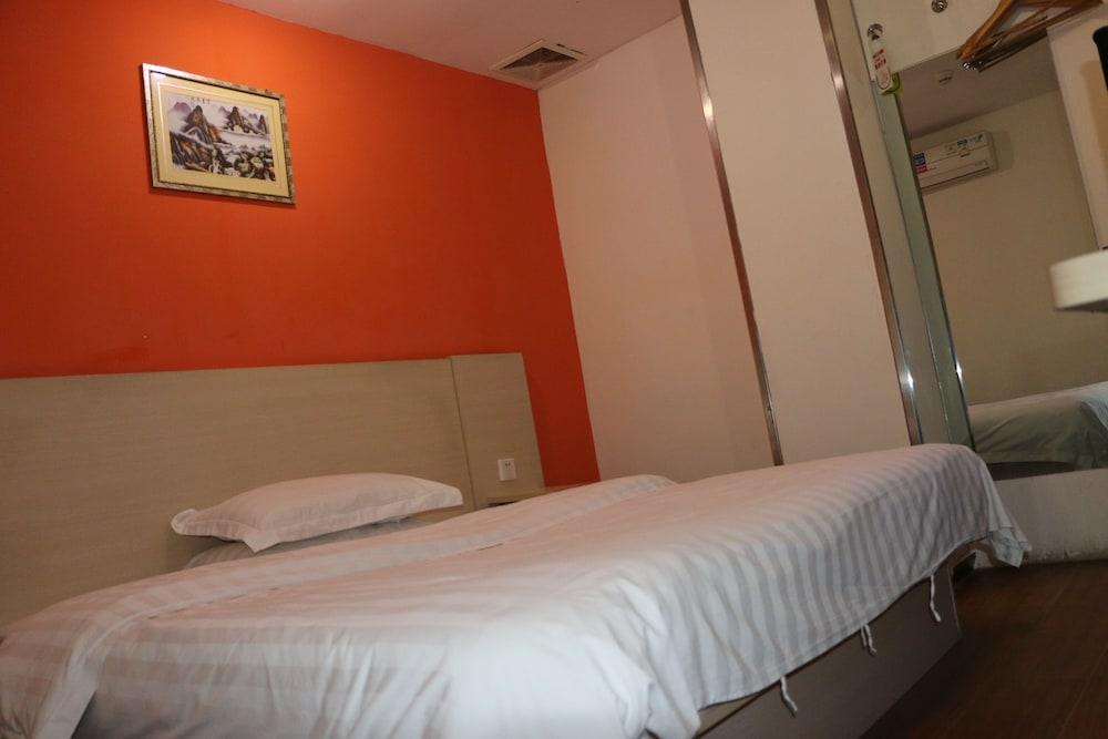 Yixin Business Hotel - Tap to explore photos