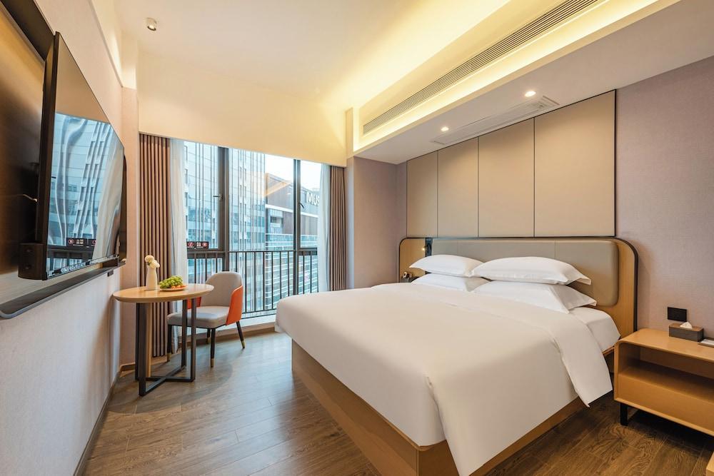 Poltton Intl Apartment Guangzhou - Tap to explore photos