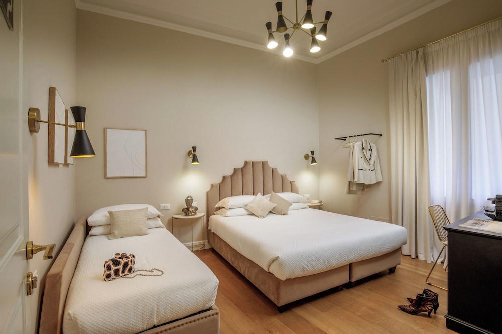 Daplace - Santa Susanna Suites Room Type - Comfort Triple Room