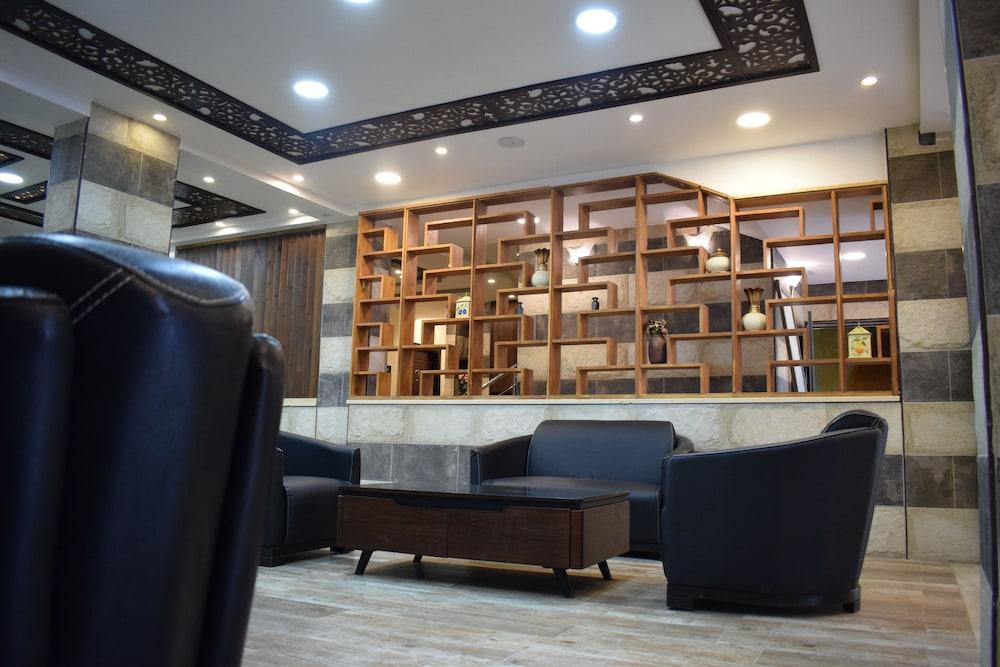 Nour Hotel Apartments - Tap to explore photos