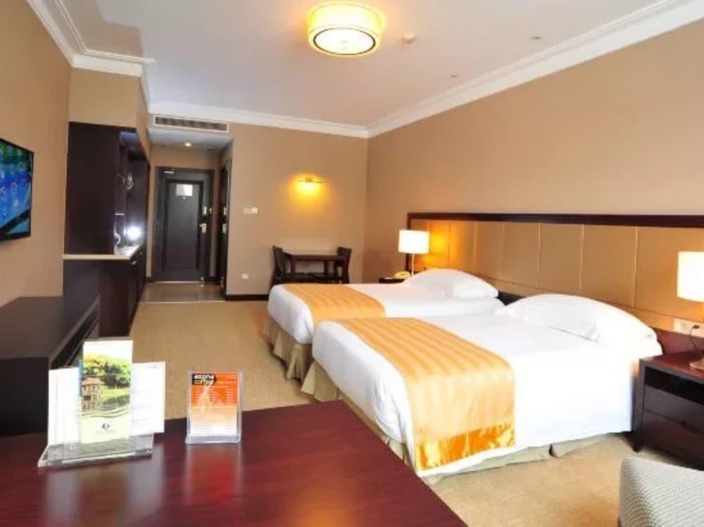 Grand Inn Xijiao State Guest Hotel - Tap to explore photos