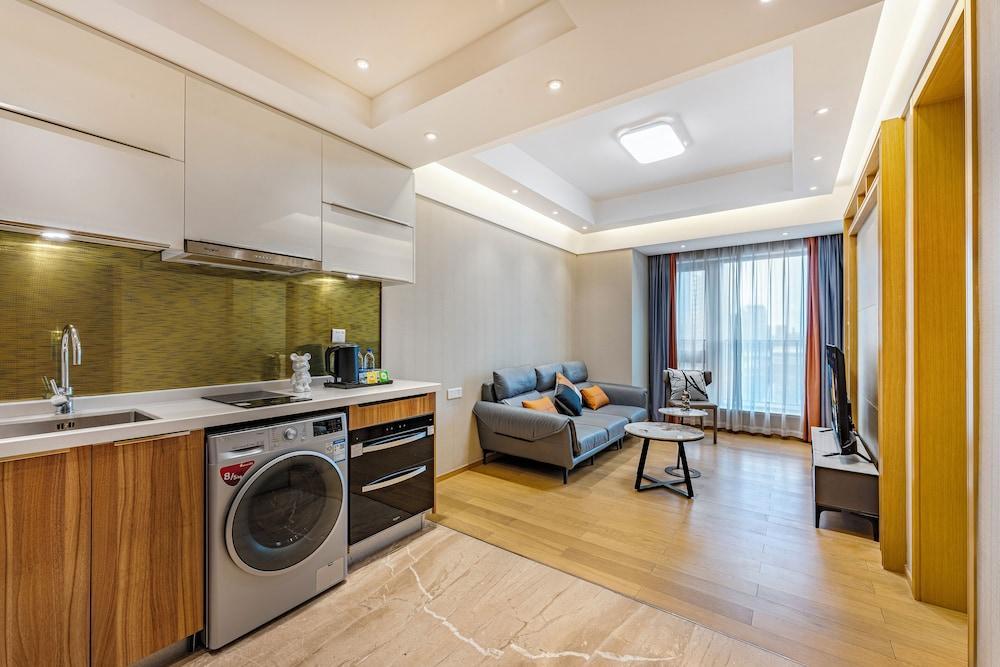 Raffles Executive Apartment - Tap to explore photos