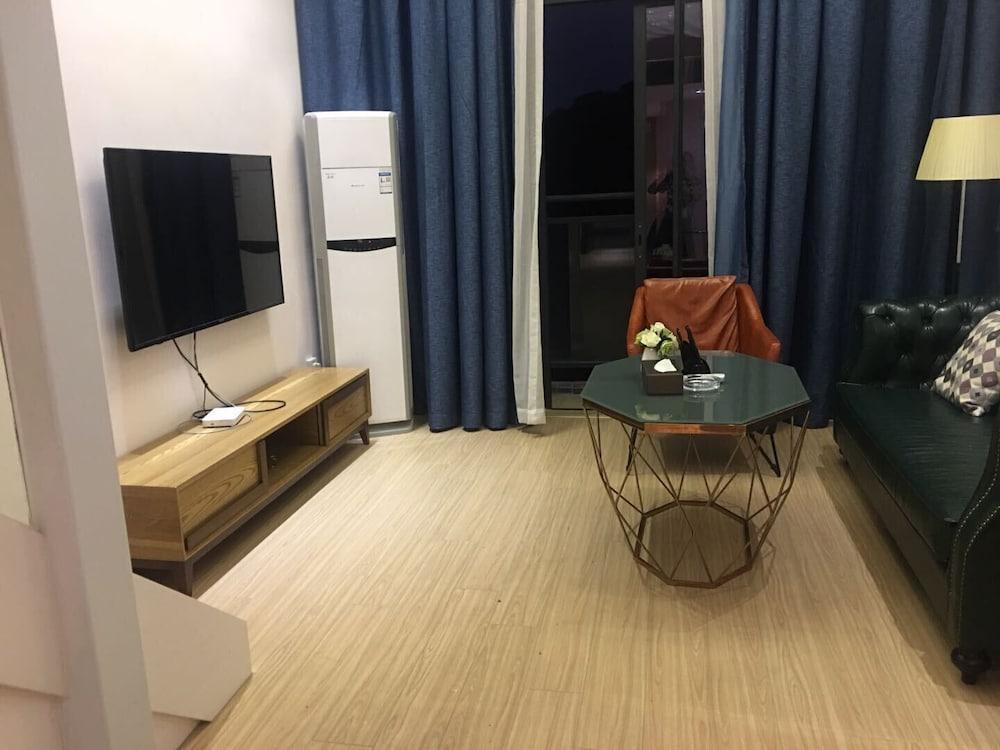 Yumi Huanju Apartment - Guangzhou Lida Plaza - Tap to explore photos