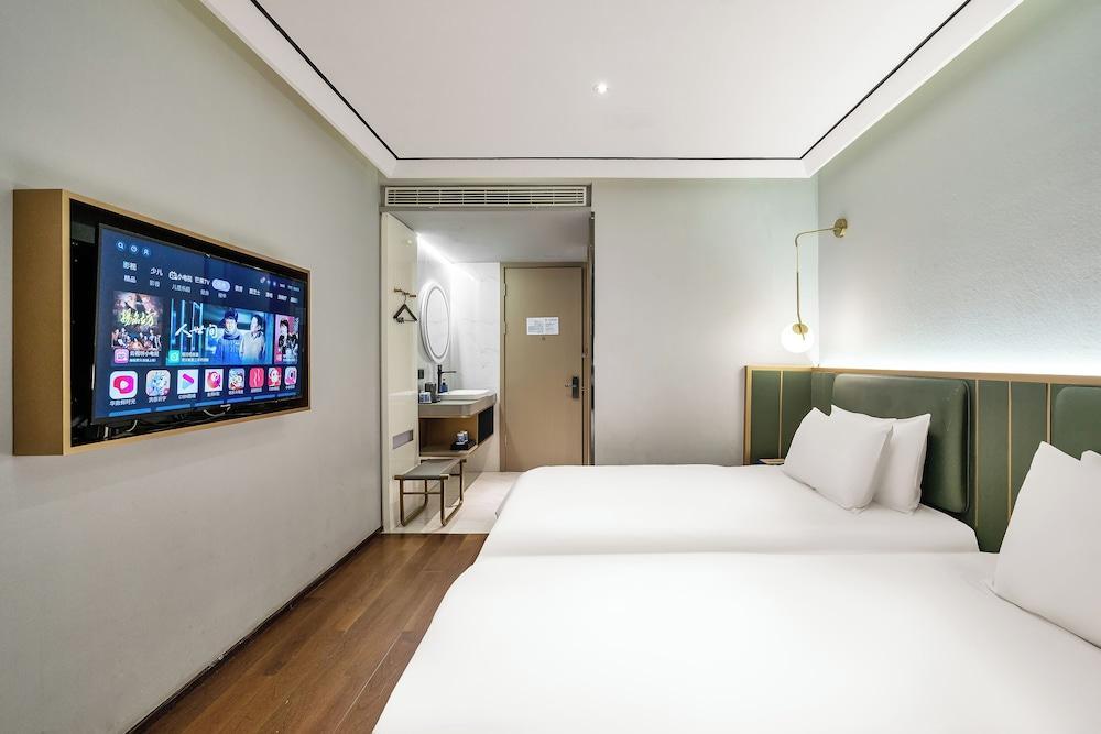 Qinfengyuan Hotel (Shanghai Xuhui District Zhongshan Hospital Jiashan Road Subway Station Branch) - Tap to explore photos
