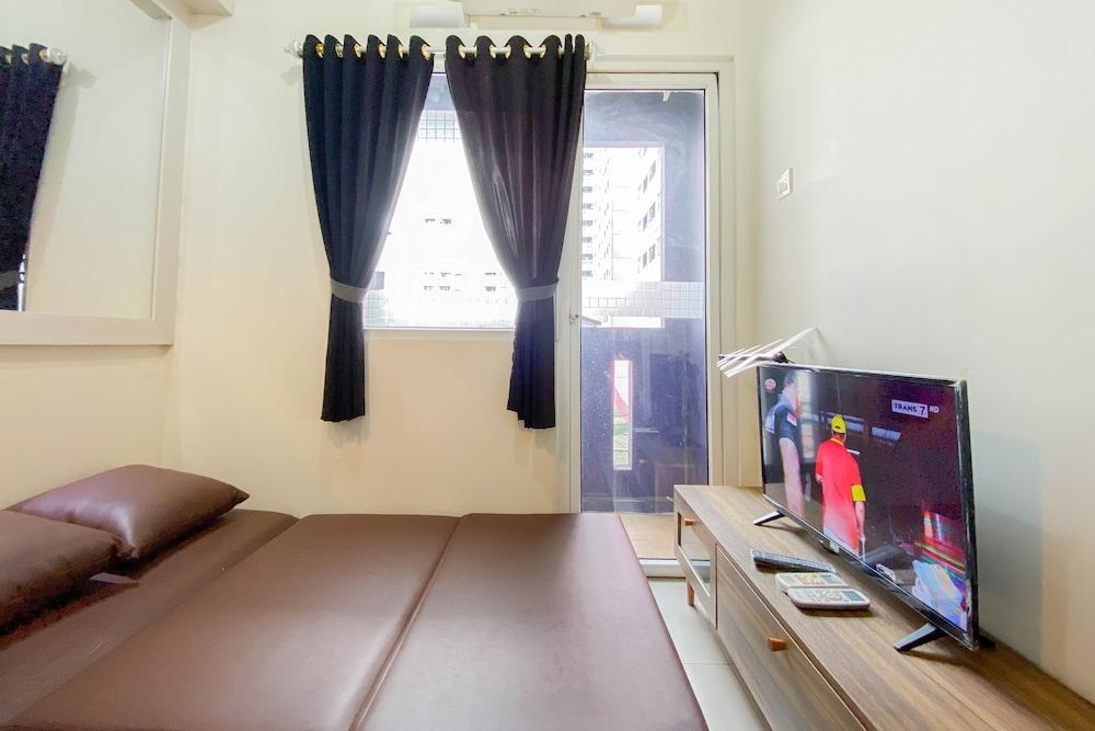 Good Choice And Homey 2Br At Green Pramuka City Apartment - Tap to explore photos