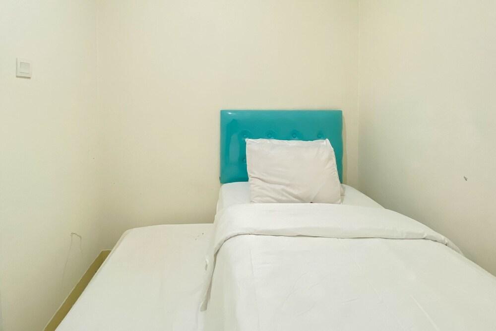 Good Choice And Homey 2Br At Green Pramuka City Apartment - Tap to explore photos