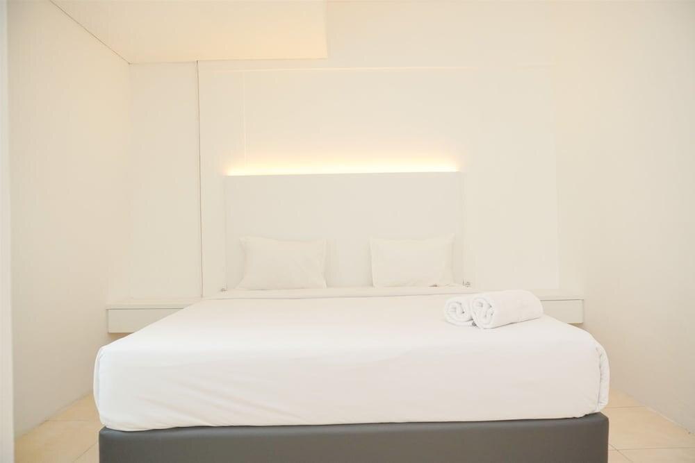 Modern And Homey 2Br At Mt Haryono Square Apartment - Tap to explore photos