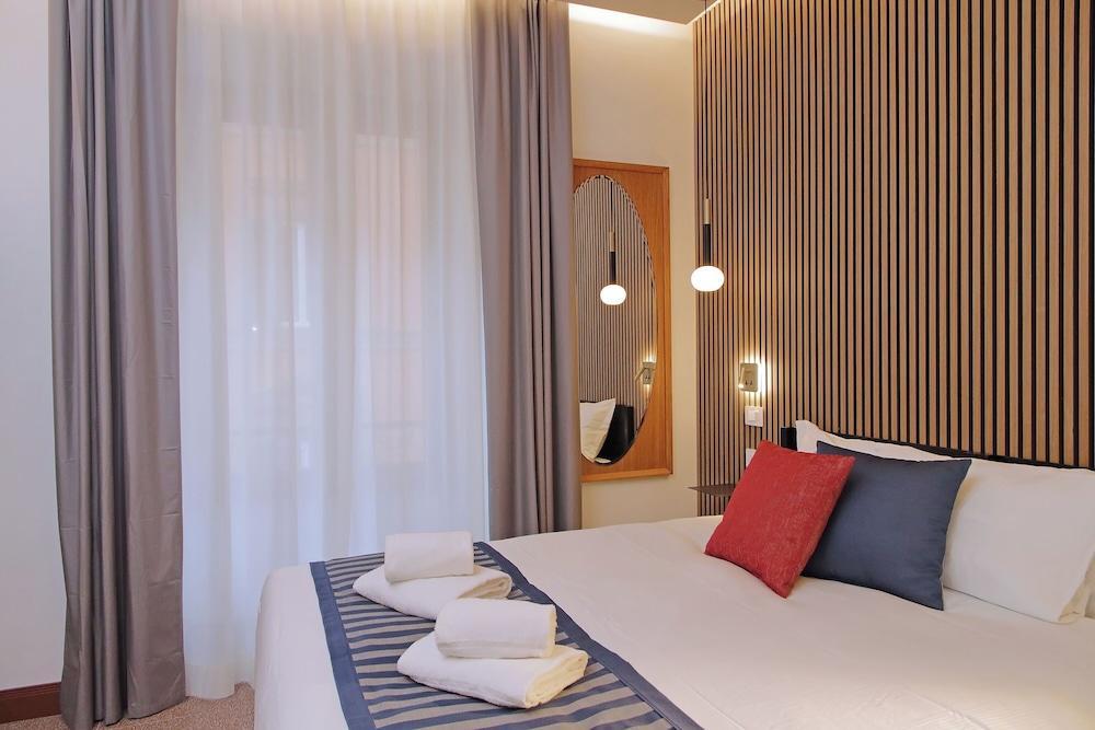 Habito Suites - Tap to explore photos