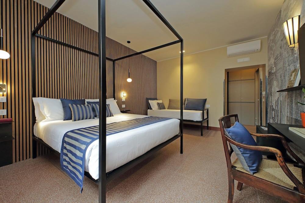Habito Suites Room Type - Deluxe Triple Room, City View