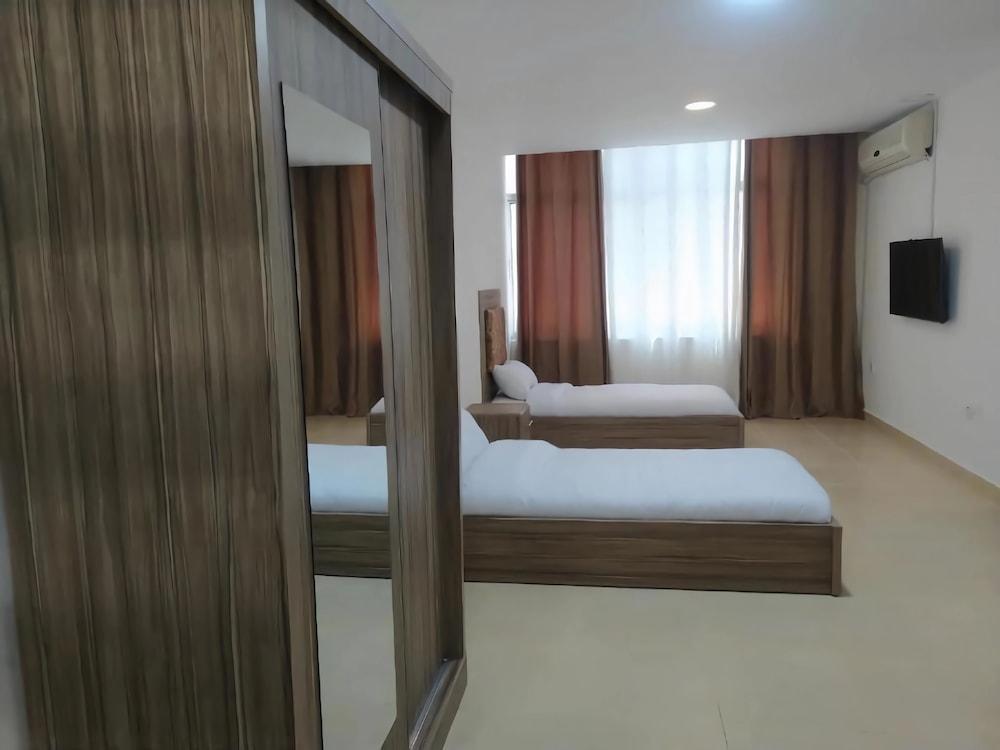 Rayan Hotel Suites - Tap to explore photos