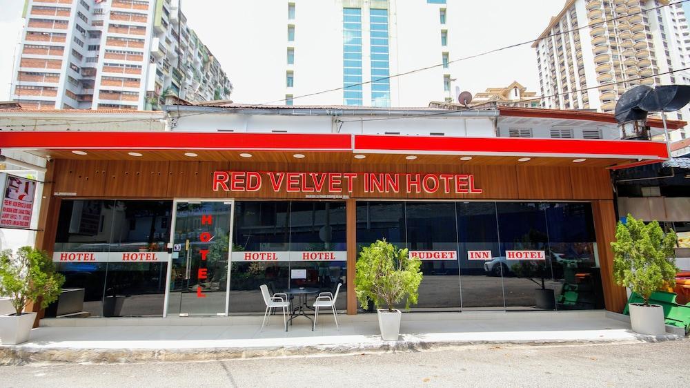Red Velvet Inn Hotel - Tap to explore photos