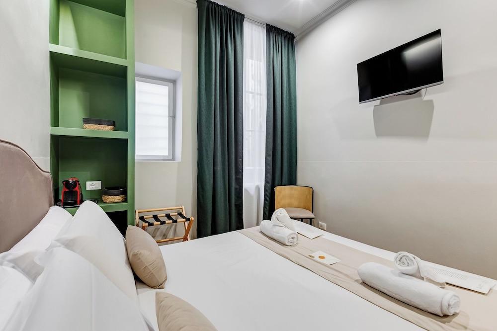 COLLINA 24 SUITES - close to VIA VENETO - Tap to explore photos