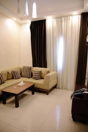 Madina Suites - Tap to explore photos