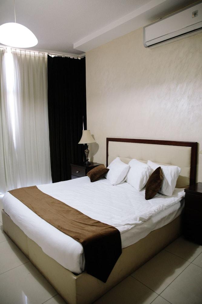 Madina Suites - Tap to explore photos