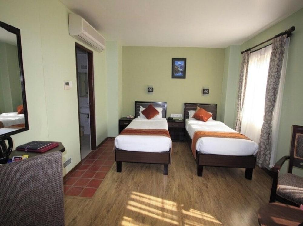 Luxe Inn Boutique Hotel - Tap to explore photos