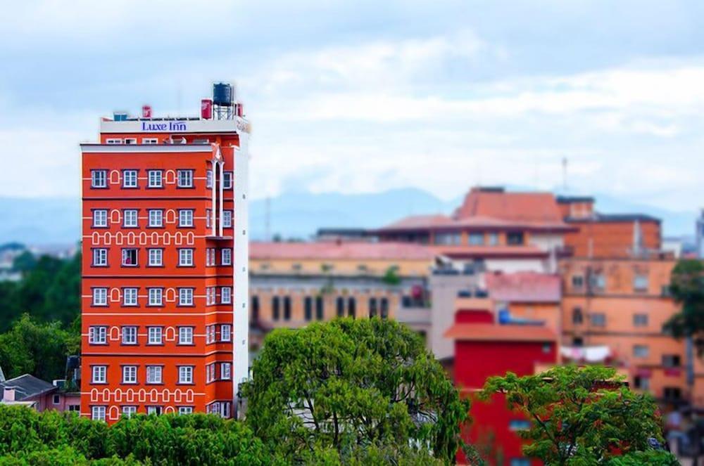 Luxe Inn Boutique Hotel - Tap to explore photos
