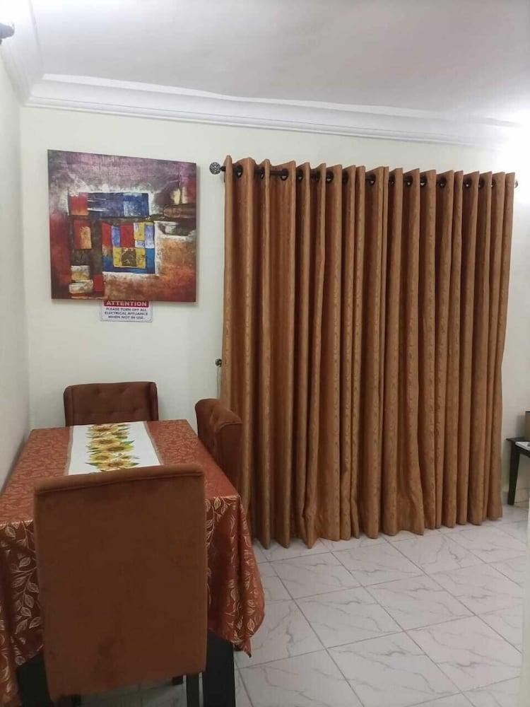 Ajah Apartment & Suites - Tap to explore photos