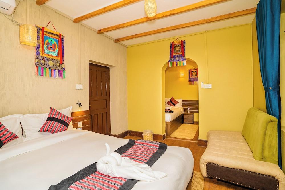 NEPALI HERITAGE HOTEL Room Type - Traditional Quadruple Room NEPALI HERITAGE HOTEL Room Type - Traditional Quadruple Room