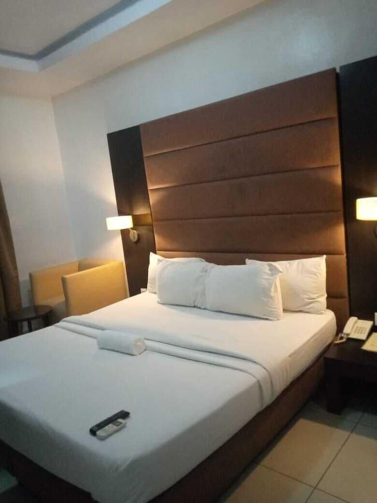 Axor Hotels And Suites - Tap to explore photos