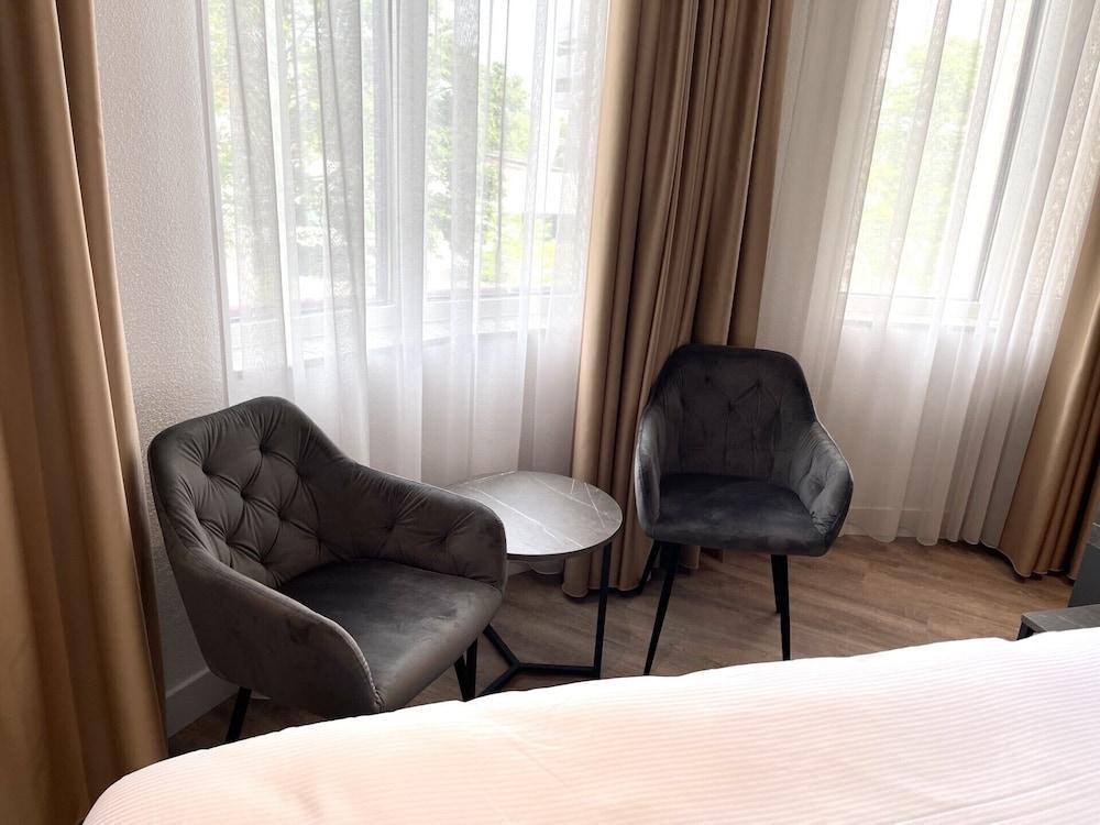 OZO Hotels Antares Airport - Tap to explore photos